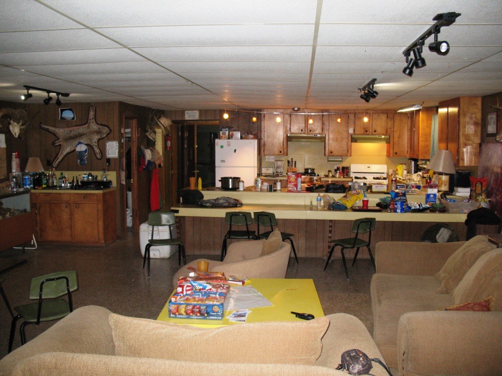 The camp common room and kitchen, with couches and a breakfast bar